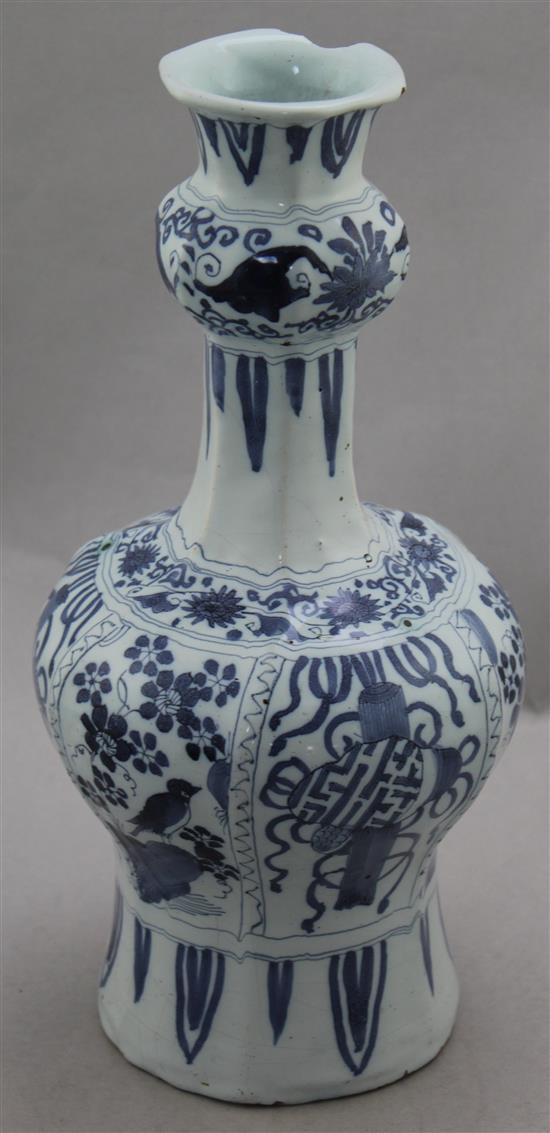 A Delft blue and white bottle vase, c.1700, 32.5cm, drilled and chipped